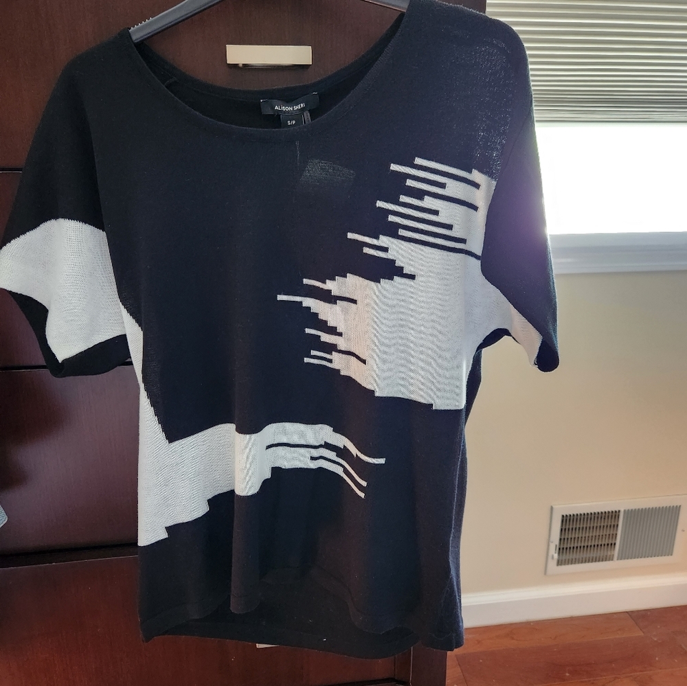 Beautiful sweater to wear with Ribkoff print skirt.